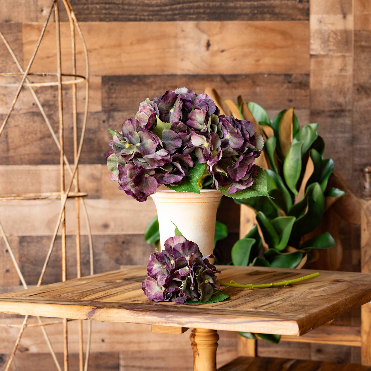 Antique Burgundy Real Touch Hydrangea Stem styled in a rich seasonal floral arrangement