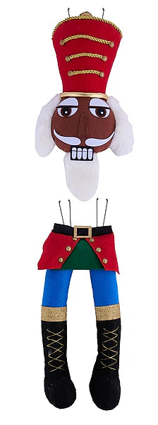 A plush nutcracker doll costume accessory shown disassembled into separate pieces against a plain white background. The set includes a red and gold tall hat, a brown and white face, white beard, red and green waist piece, blue legs, and black boots with gold trim.