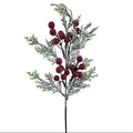 Snowy green grass spray with clusters of glossy red berries and frosted white accents