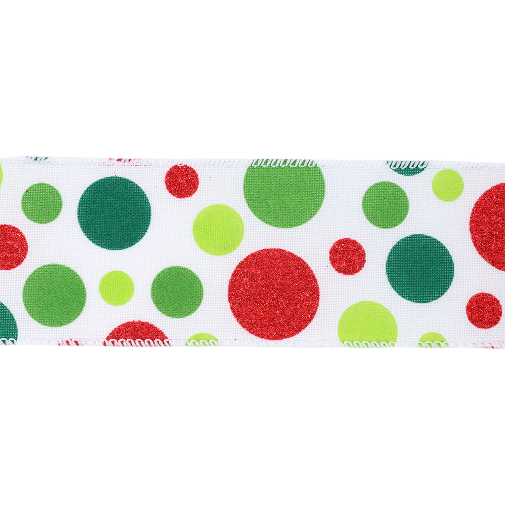 A close-up horizontal strip of white ribbon or fabric trim featuring a festive pattern of red and green glittery polka dots of various sizes on a white background.